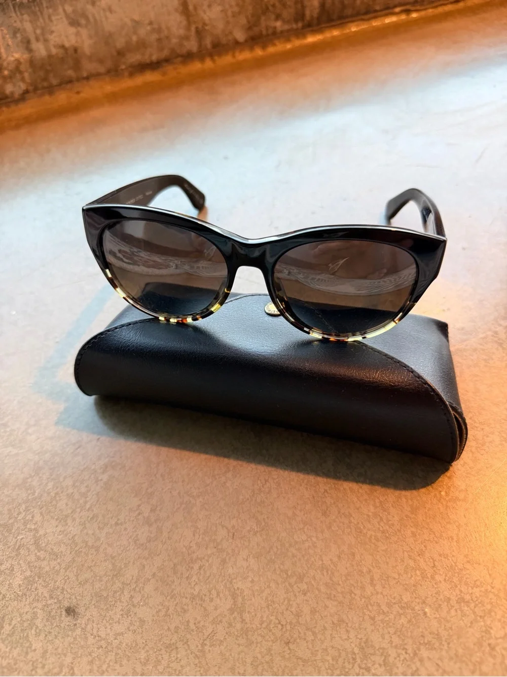 Oliver Peoples Black Cat-Eye Sunglasses with Tortoise Accents